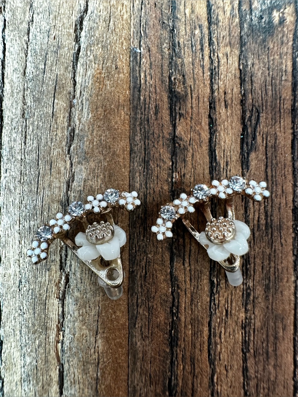 Gold-Tone White Floral Clip Earrings with Crystal Accents